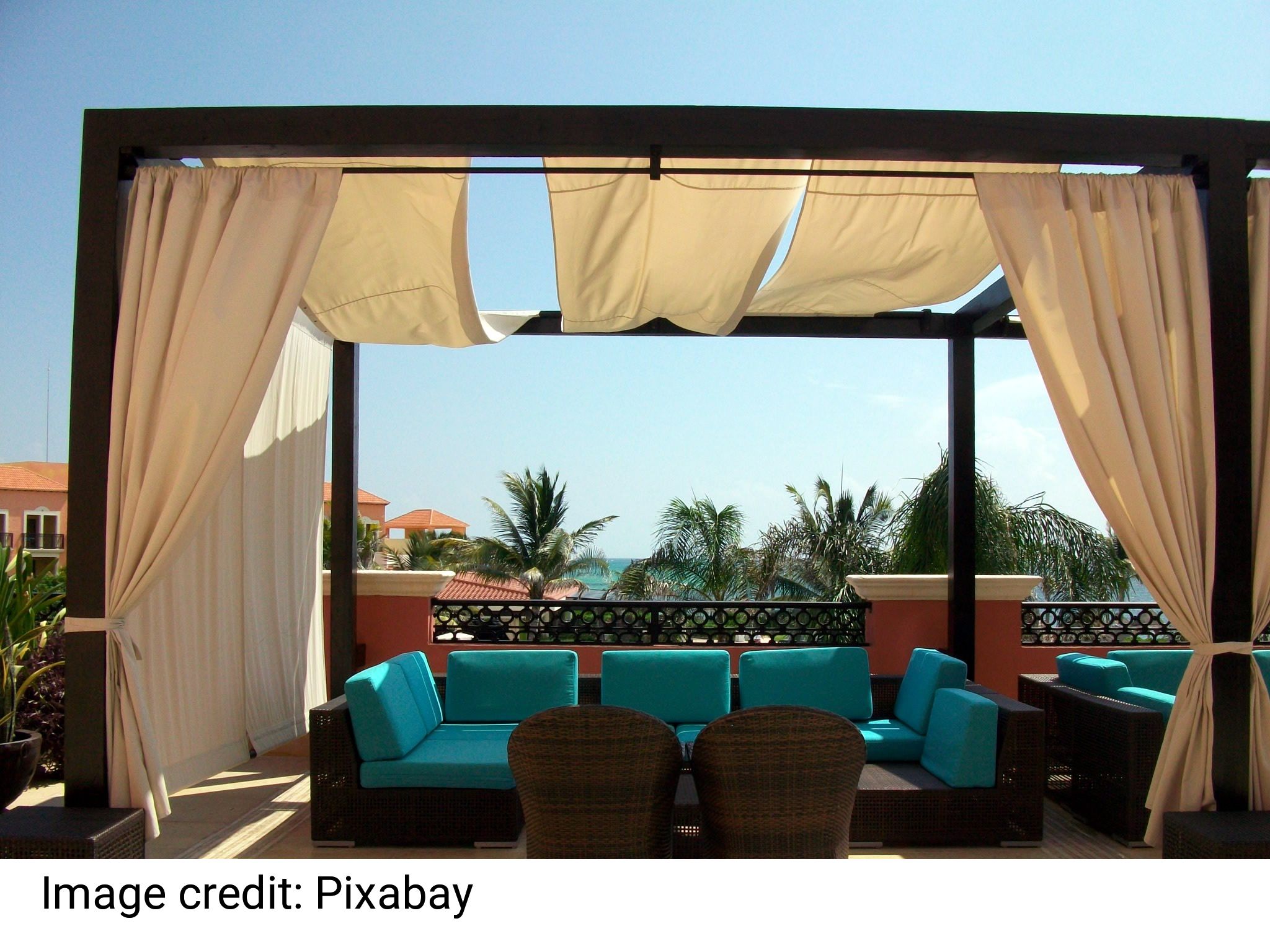 Two Brown Wooden Outdoor Chairs